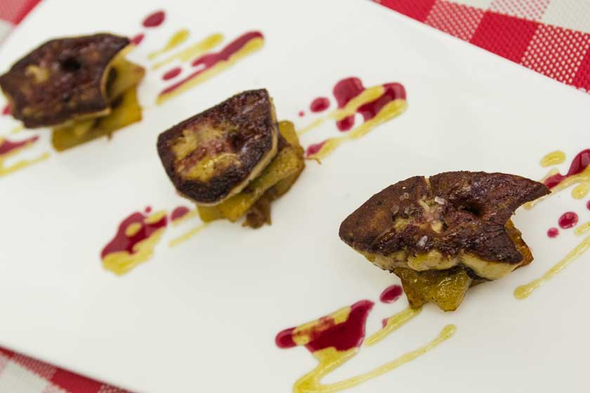 Duck Liver on Potato, Caramelized Onions, Clamansi and Berry Glaze